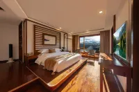 Tengchong Jingxin Valley Hot Spring Panoramic Inn (Heshun Ancient Town Branch) - سبا