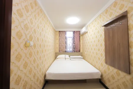 Shell Hotel (Yushu) Отели в г. Юйшу