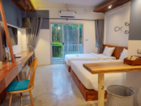 ดูก๊องวิลเลจ-กรีนโฮเทล โรงแรมในอำเภอ สิเกา