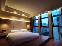 Xinderui Hotel Hôtels à : Dechang