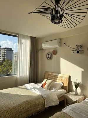 Xichang Fengqing B&B (Qionghai Wetland Park)