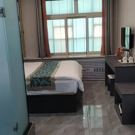 Puru Express Hotel Отели рядом с достопримечательностью «Китайская медицинская больница, Хулань, Харбин»