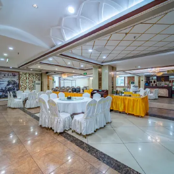 Wudeng Garden Hotel Отели рядом с достопримечательностью «Стадион «Фулин»»