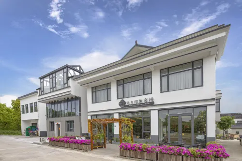 Suzhou Dao Xiang Impression Homestay (Cai Flower Sea Shop in Bei Tai Lake Tourist Vacation Area)