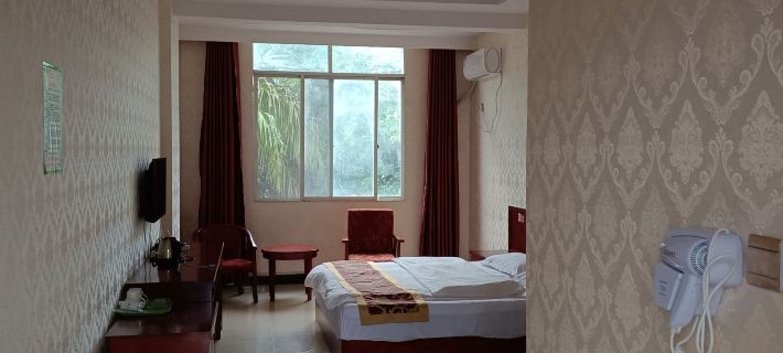 Marriott Business Hotel in Huola (Mohan Railway Station) Hotel di Mengla