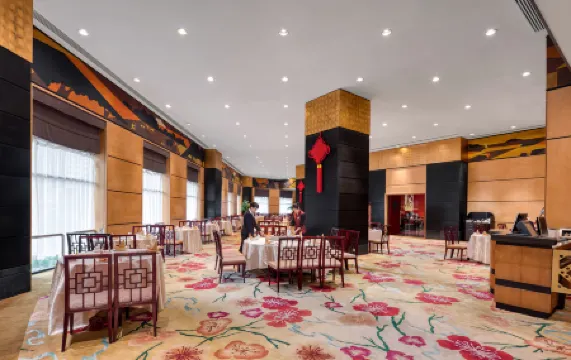 Hainan Junhua Haiyi Hotel Отели рядом с достопримечательностью «Time Plaza»