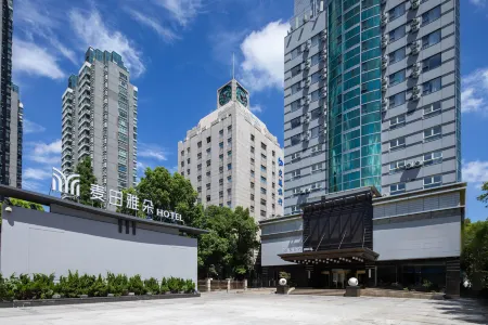 MEETADO Hotel Jiaxing Отели рядом с достопримечательностью «Xiuzhou Park»