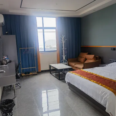 Shujie Hotel Отели в г. Эшань