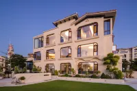 Linghai. Muchen Seavilla Hotels in Джанджоу