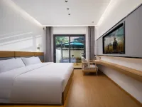 Back Garden · Duoli Garden Hotel (Splashing Water Square Branch, Jinghong, Xishuangbanna) โรงแรมใกล้สวนมันตง