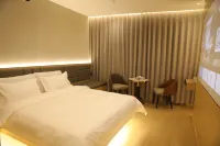 Yunshangyue Hotel (Humen Town Junlehui Shopping Center Landmark Cultural Plaza) Hotel in zona Shajiao Fort