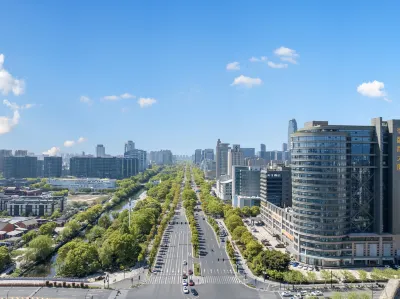 Taizhou Meizhu Hotel (Jiaojiang City Government Avenue Baolongcheng Store)