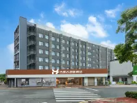 Guangmingren Wellness Hotel (Xiamen Gaoqi Airport SM Plaza) Hotels near Huli