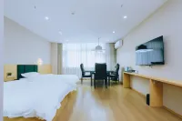 Yichang Qishenghui Hotel (Olympic Sports Center University Town) Hotell i Dianjun District