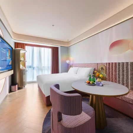 Manxin Longmen Station Hotel