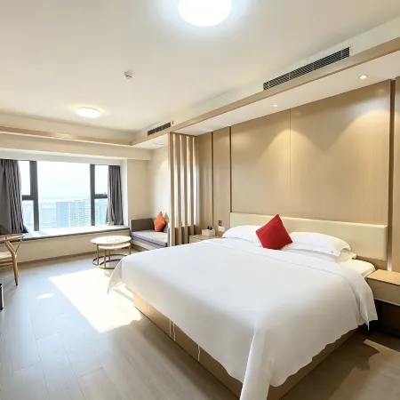 Junmao Hotel Apartment Отели рядом с достопримечательностью «Река Фучуньцзян»