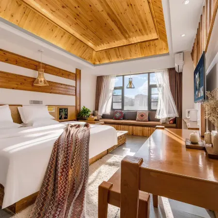 Mutan Hotel Отели в г. Цюйцзин