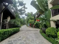 Xishuangbanna Jinghong Yunman Valley Villa Resort Hotel (Yuejingzhuang) - maisons de vacances