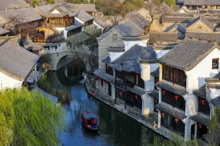 Lantingju Light Luxury Bieyuan (Taierzhuanggucheng Scenic Spot Branch) Отели рядом с достопримечательностью «Zaozhuang Technician College Tai'erzhuang Branch»