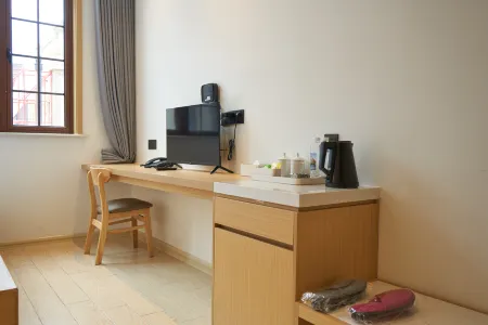 Fenghua Xikou Yingmengli Heitao Guest House Отели рядом с достопримечательностью «Shanglianggang Scenic Area»