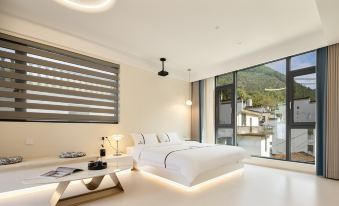 Wuyuan Guling Yunshangshangju Suites