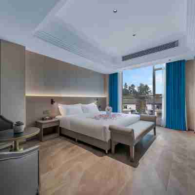 万信ホテル(自貢富順沿灘高速鉄道駅) Rooms