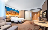 Vienna International Hotel (Lianyungang Huaguoshan Avenue Wanda Plaza) Hotel a Huaihai Institute of Technology/Wanda Plaza