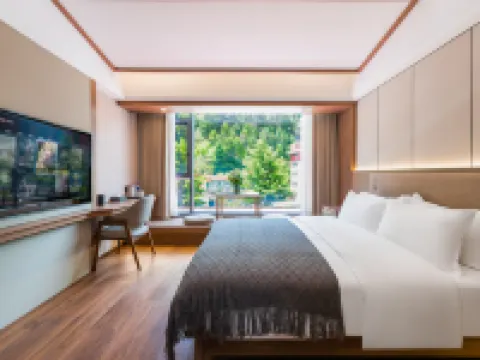 บิสซิเนส โฮเต็ล กุ้ยซาน (สาขา เขตทิวทัศน์ซวงเฉียวโกว) ภูเขาสื่อกูเนี่ยง โรงแรมในเซี่ยวจิน