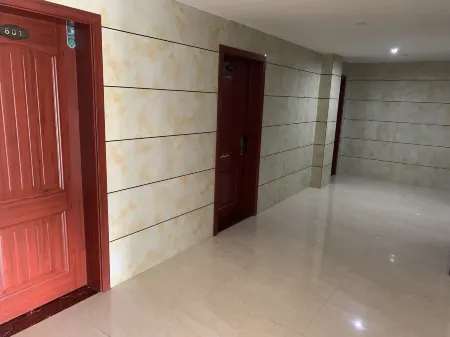 Longshi Xingbiao Business Hotel Отели рядом с достопримечательностью «Octagon House»