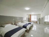 Xinjinlong Holiday Hotel (Linzhou Avenue Bus Station)