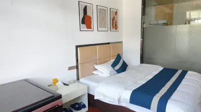 Qingyuan Wenqing Business Hotel Отели рядом с достопримечательностью «Шанхайский город (Цин Юань)»