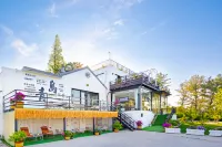Meet Four Seasons Boutique Art Homestay (Qingdao Laoshan Scenic Area) - Vila