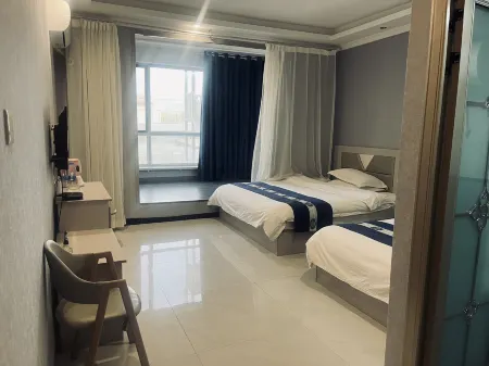 Aksai Happy Hotel Отели рядом с достопримечательностью «Народное правительство Аксе Казахского автономного округа»