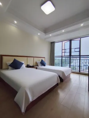 Dongxing Xinlongyuan Hotel Отели рядом с достопримечательностью «Ван Тай Цзинь Бич»