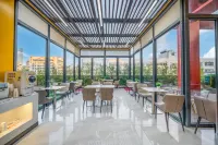Ru Jia Aifee Hotel (Haikou Qilou Old Street Sun Moon Square Duty Free Shop) - พร้อมอาหารเช้า