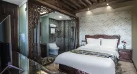 Xishe Boutique Inn فنادق في ويشان