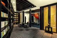Yujian Inn Отели в г. Тенчун
