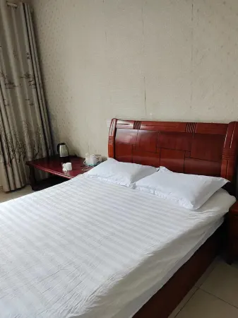 Yongxin Jinye Hotel Отели рядом с достопримечательностью «Mao Zedong Former Residence (Northwest to Sanwan Travel Shopping Center)»