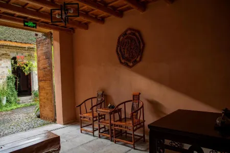 Qingyou Youju Hostel Отели рядом с достопримечательностью «Ruoliao Yuanshilin»