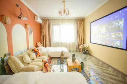 Jiuqinju Rest Xiangyang Audiovisual Homestay (Huaihua High speed Railway  Station Branch)