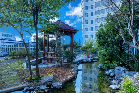 Qujing Yishi Yihe Hotel (Cuifeng Road, Qilin District) Отели рядом с достопримечательностью «Qujing Normal University»