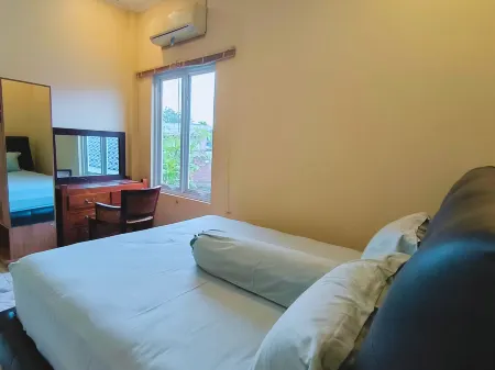 Pomah Guesthouse Отели рядом с достопримечательностью «Istana Batu»