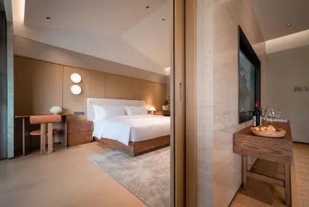 kapok Lane Garden Hotel Отели рядом с достопримечательностью «Xinyang Normal University»