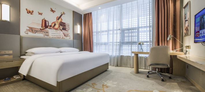Bachu Populus Euphratica International Hotel (Shiji Avenue Branch, Bachu Pedestrian Street) Các khách sạn ở Maralbexi