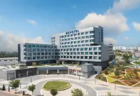 陽泉高新諾富特酒店 鄰近陽泉市體育中心-體育場的酒店