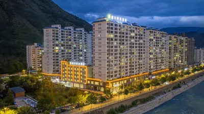 Super 8 Collection Hotel (Longnan Tanchang Guan'egou Branch) Hotel in zona Eman Valley