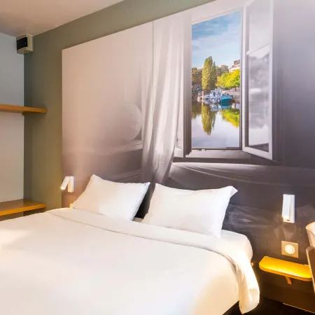 B&B Hotel Nantes Parc Expos la Chapelle Отели рядом с достопримечательностью «Станция Haluchère-Batignolles»