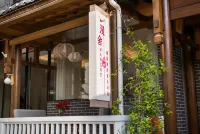 ZHangjiajie Manshe Inn -  Privatzimmer
