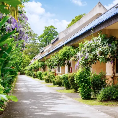 棕櫚小屋度假酒店 鄰近วัดควนลัง的酒店