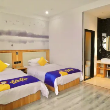 Qitian Hotel (Gaoping Youyi Street Store)